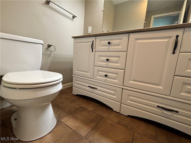 1312 Glennview St NE, Canton, OH 44721 - bathroom with vanity and tile patterned flooring