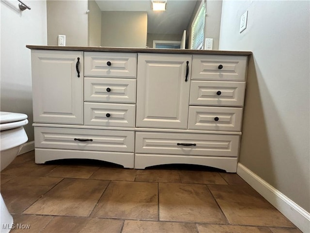 1312 Glennview St NE, Canton, OH 44721 - bathroom with toilet and vanity