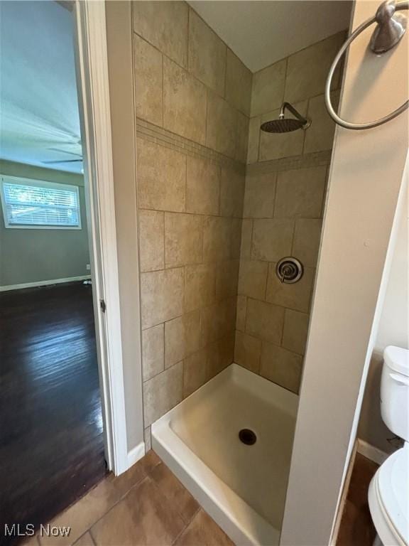 1312 Glennview St NE, Canton, OH 44721 - bathroom with tiled shower and tile patterned floors