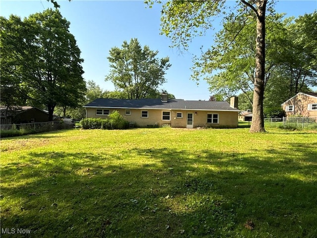 1312 Glennview St NE, Canton, OH 44721 - back of property featuring a chimney