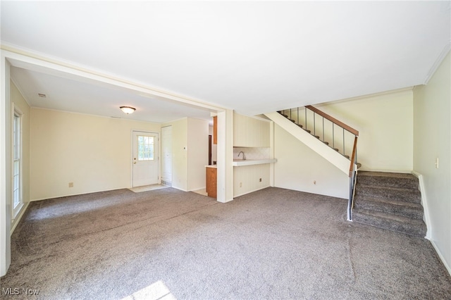 7297 Trotter Ln Unit B, Mentor, OH 44060 - unfurnished living room featuring stairs and carpet flooring