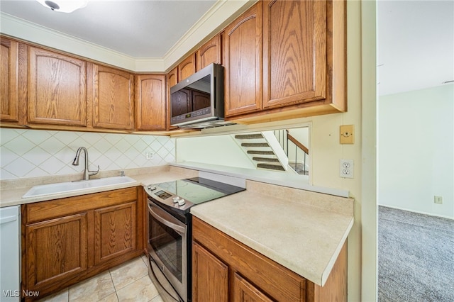 7297 Trotter Ln Unit B, Mentor, OH 44060 - kitchen with stainless steel appliances and brown cabinets