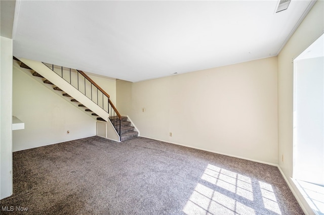 7297 Trotter Ln Unit B, Mentor, OH 44060 - unfurnished living room with stairway and carpet flooring