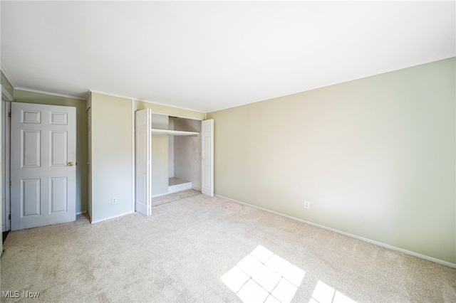 7297 Trotter Ln Unit B, Mentor, OH 44060 - unfurnished bedroom featuring light carpet, a closet, and ornamental molding