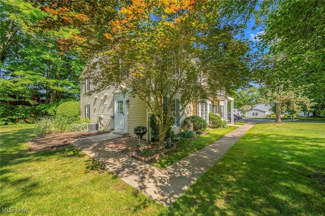 7297 Trotter Ln Unit B, Mentor, OH 44060 - view of home's exterior with a yard