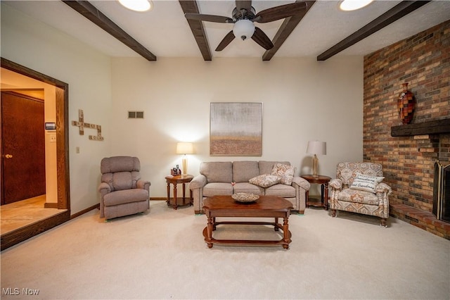 6685 Elwood St, Austintown, OH 44515 - carpeted living area featuring beamed ceiling and ceiling fan