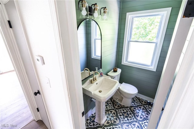 6580 Crossview Rd, Seven Hills, OH 44131 - bathroom featuring toilet and wooden walls