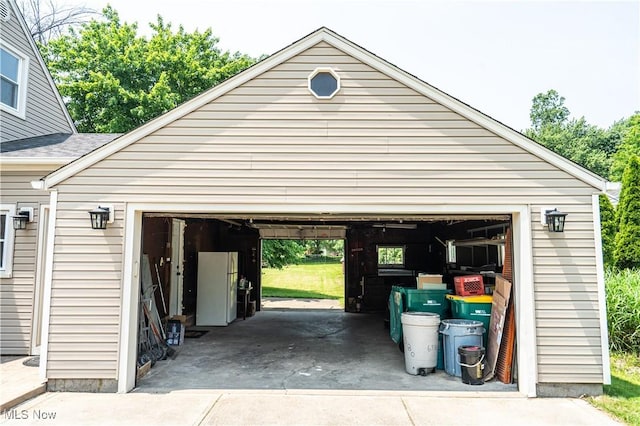 6580 Crossview Rd, Seven Hills, OH 44131 - garage featuring freestanding refrigerator