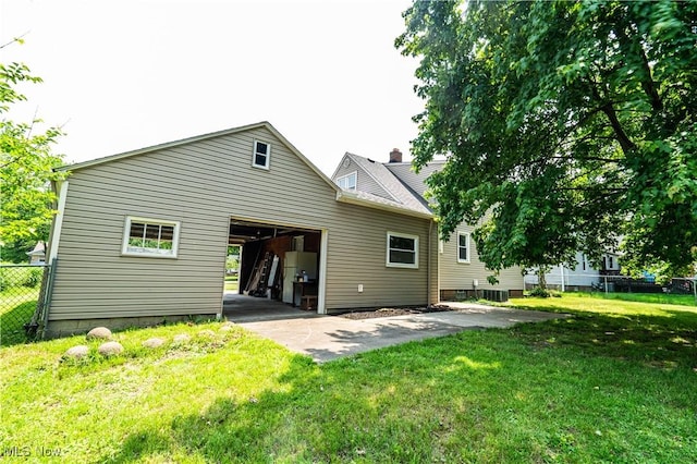 6580 Crossview Rd, Seven Hills, OH 44131 - rear view of house featuring a garage
