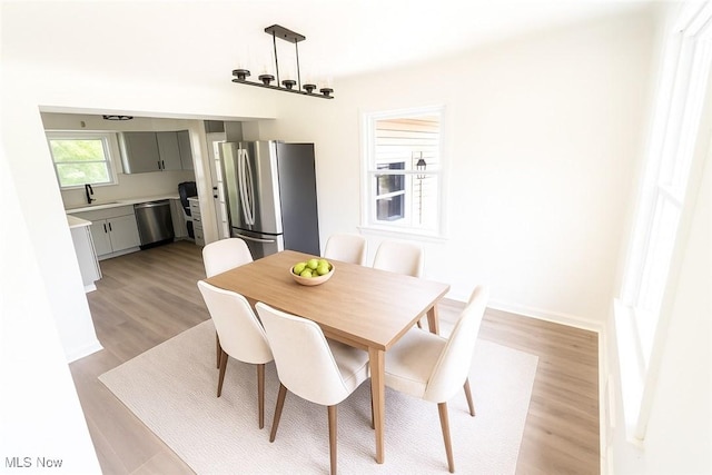 6580 Crossview Rd, Seven Hills, OH 44131 - dining space featuring light wood-type flooring