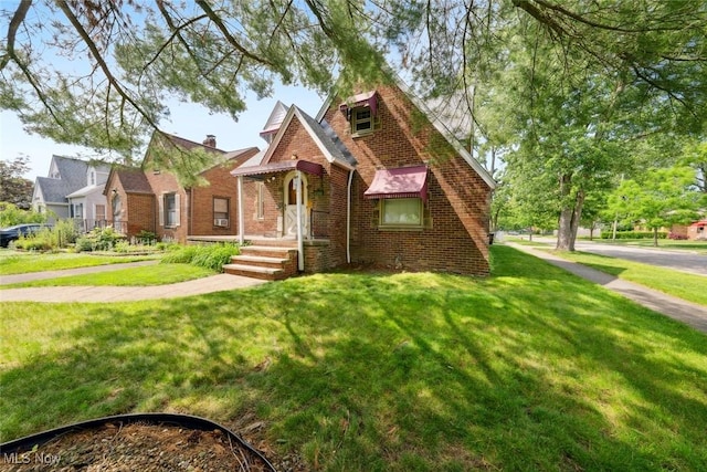 16200 Elsienna Ave, Cleveland, OH 44135 - tudor home with brick siding and a front lawn