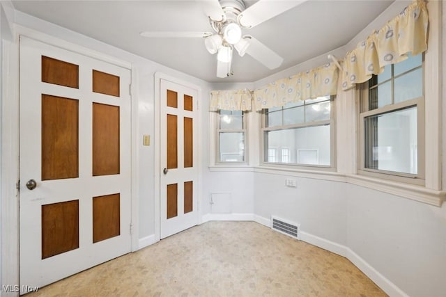 16200 Elsienna Ave, Cleveland, OH 44135 - carpeted empty room with plenty of natural light and ceiling fan