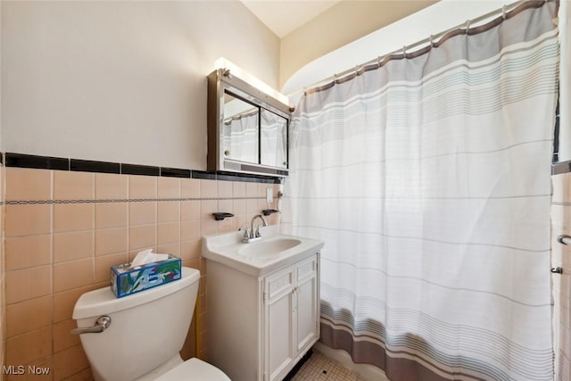 16200 Elsienna Ave, Cleveland, OH 44135 - bathroom with vanity, tile walls, and a shower with curtain