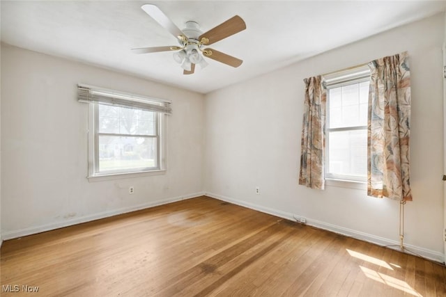16200 Elsienna Ave, Cleveland, OH 44135 - unfurnished room with hardwood / wood-style flooring, healthy amount of natural light, and a ceiling fan