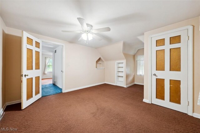 16200 Elsienna Ave, Cleveland, OH 44135 - additional living space featuring dark colored carpet, ceiling fan, and vaulted ceiling