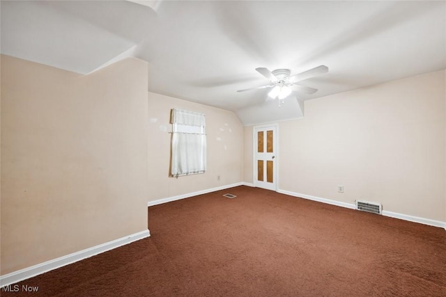 16200 Elsienna Ave, Cleveland, OH 44135 - spare room featuring ceiling fan, dark colored carpet, and vaulted ceiling