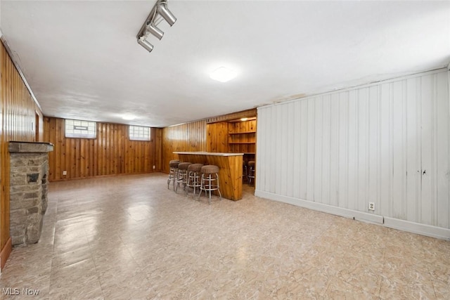 16200 Elsienna Ave, Cleveland, OH 44135 - indoor dry bar featuring wooden walls and tile patterned floors