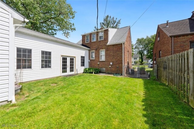 16200 Elsienna Ave, Cleveland, OH 44135 - back of house featuring french doors and a fenced backyard