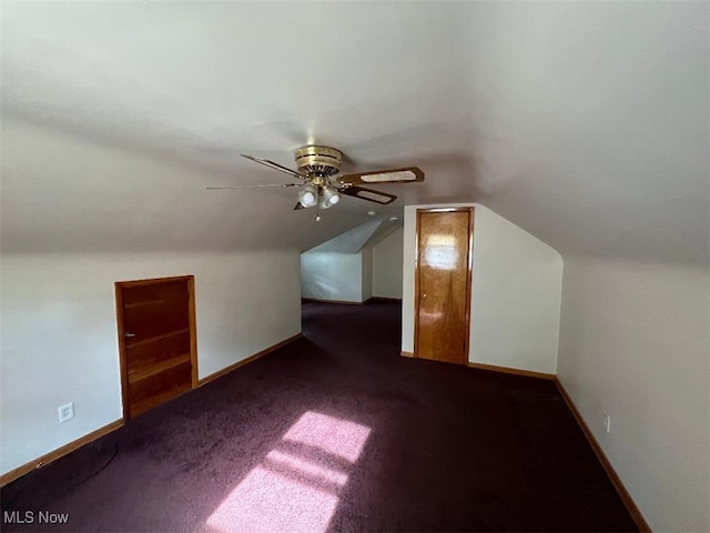 24850 Zeman Ave, Euclid, OH 44123 - additional living space featuring dark carpet, a ceiling fan, and vaulted ceiling