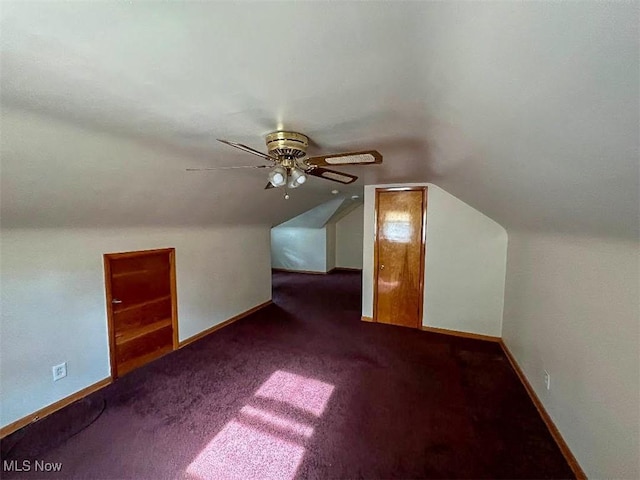 24850 Zeman Ave, Euclid, OH 44123 - additional living space with dark colored carpet, a ceiling fan, and lofted ceiling