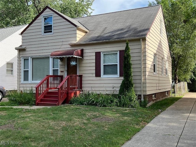 24850 Zeman Ave, Euclid, OH 44123 - bungalow-style house featuring a front lawn and roof with shingles