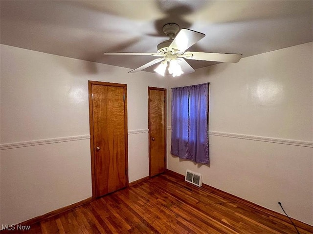 24850 Zeman Ave, Euclid, OH 44123 - unfurnished bedroom with wood finished floors and ceiling fan