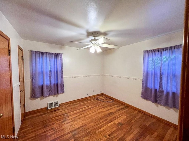 24850 Zeman Ave, Euclid, OH 44123 - spare room featuring wood finished floors and ceiling fan