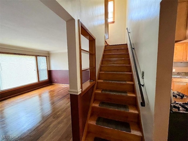 24850 Zeman Ave, Euclid, OH 44123 - staircase featuring wood finished floors and baseboards