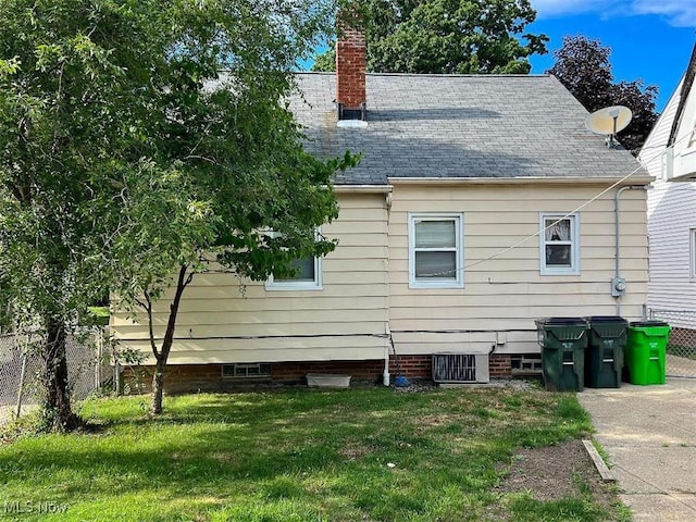 24850 Zeman Ave, Euclid, OH 44123 - rear view of house with a chimney