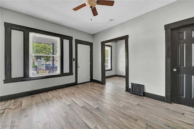 3620 E 63rd St, Cleveland, OH 44105 - foyer entrance with wood finished floors and ceiling fan