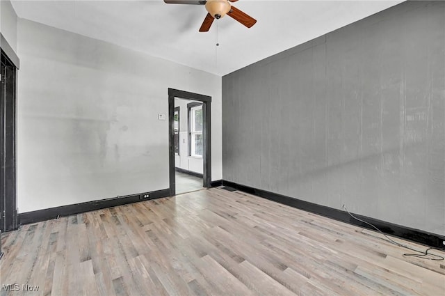 3620 E 63rd St, Cleveland, OH 44105 - spare room with wood finished floors and ceiling fan