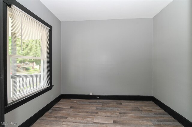3620 E 63rd St, Cleveland, OH 44105 - empty room featuring wood finished floors and baseboards