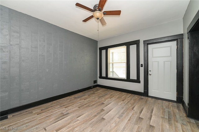3620 E 63rd St, Cleveland, OH 44105 - empty room with wood finished floors and ceiling fan