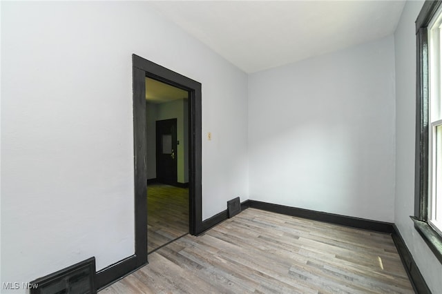 3620 E 63rd St, Cleveland, OH 44105 - spare room with light wood finished floors and plenty of natural light