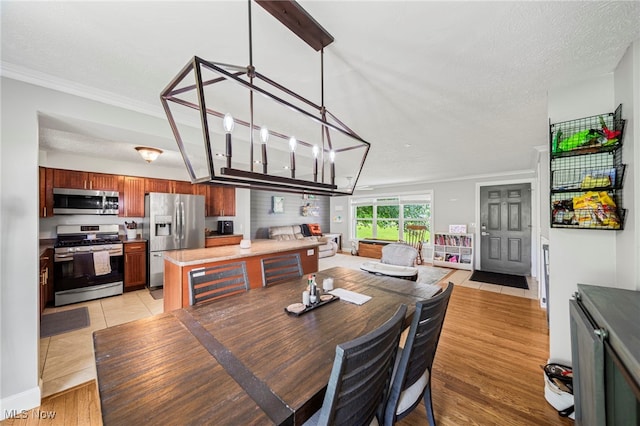 350 Townline Rd, Aurora, OH 44202 - dining room with ornamental molding and light tile patterned floors