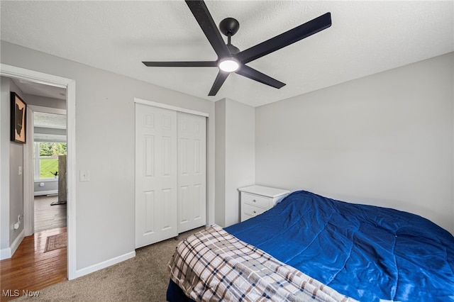 350 Townline Rd, Aurora, OH 44202 - bedroom featuring a textured ceiling, ceiling fan, and a closet