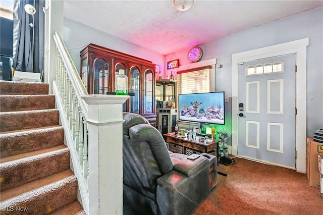 3676 E 69th St, Cleveland, OH 44105 - living room with carpet flooring and stairs