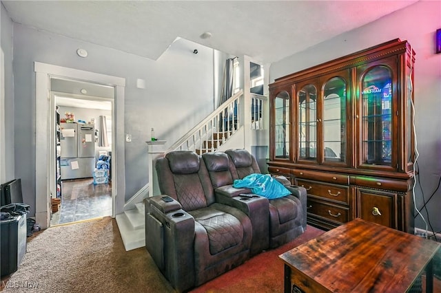 3676 E 69th St, Cleveland, OH 44105 - living room with stairway and carpet floors