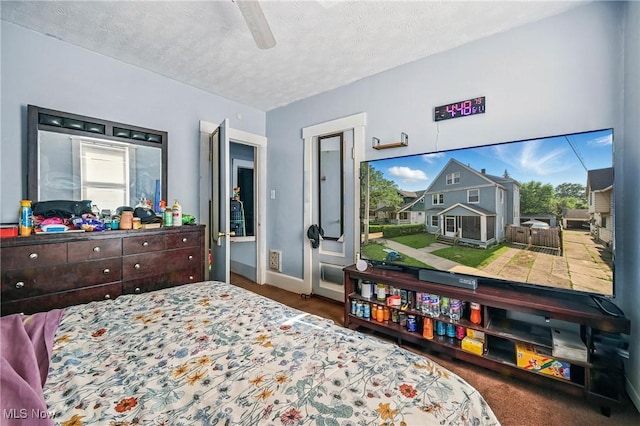 3676 E 69th St, Cleveland, OH 44105 - bedroom featuring a textured ceiling and carpet flooring