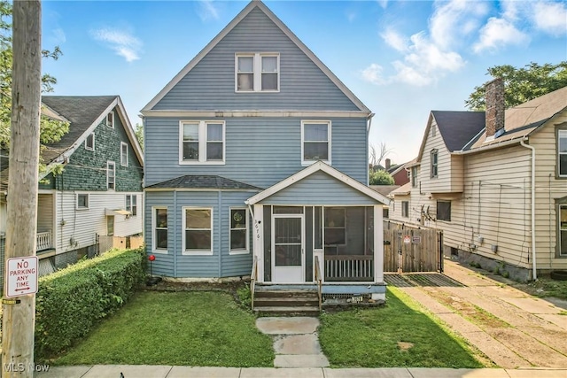3676 E 69th St, Cleveland, OH 44105 - traditional style home featuring a sunroom and entry steps