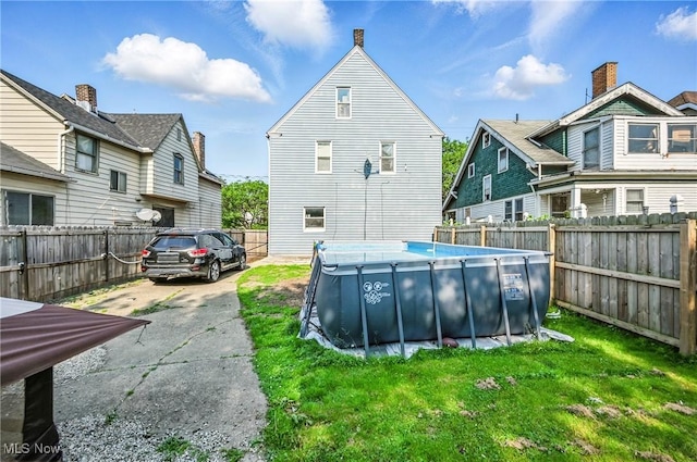 3676 E 69th St, Cleveland, OH 44105 - back of property with a fenced backyard