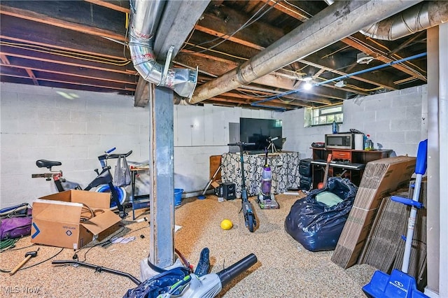 3676 E 69th St, Cleveland, OH 44105 - workout room featuring concrete block wall