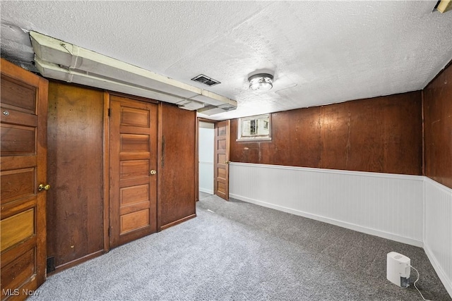 1369 Adelaide Ave SE, Warren, OH 44484 - basement with carpet floors and a textured ceiling