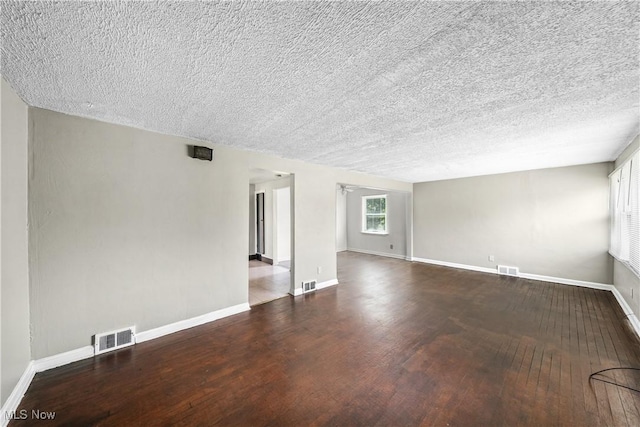 1369 Adelaide Ave SE, Warren, OH 44484 - spare room with hardwood / wood-style floors and a textured ceiling