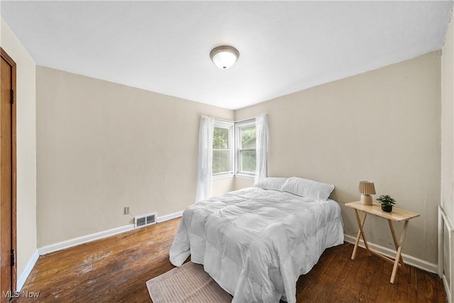 1369 Adelaide Ave SE, Warren, OH 44484 - bedroom with baseboards and wood-type flooring