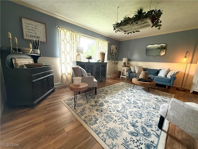 14003 N Highview Dr, Dalton, OH 44618 - sitting room with ornamental molding, a textured ceiling, a wainscoted wall, and wood finished floors