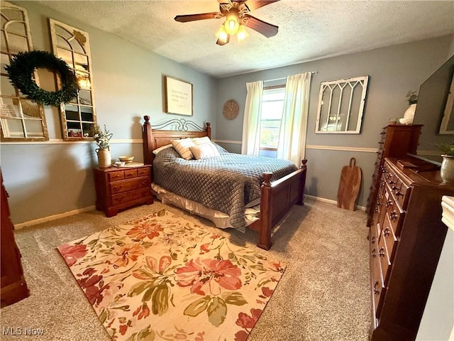 14003 N Highview Dr, Dalton, OH 44618 - bedroom with a textured ceiling, light colored carpet, and ceiling fan