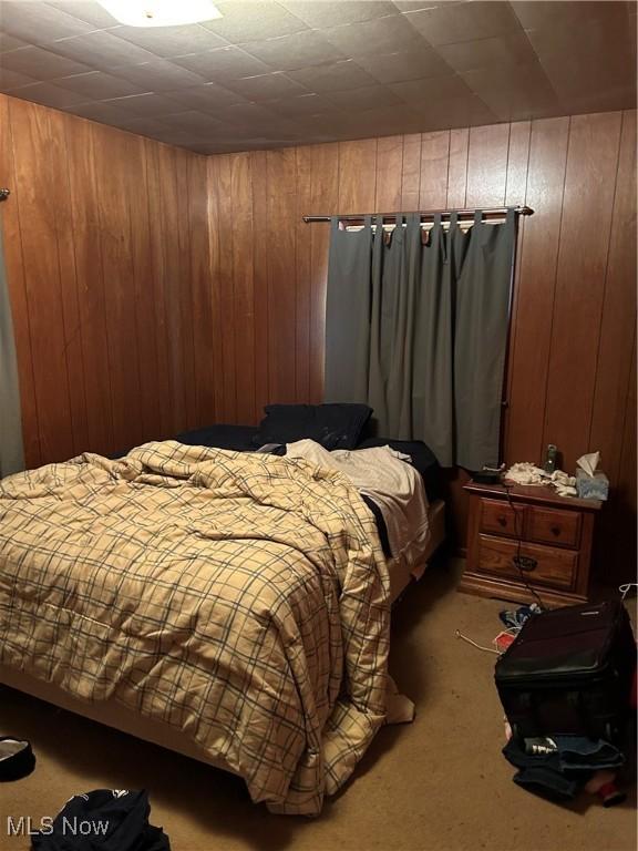 925 Ohio Ave, Mcdonald, OH 44437 - carpeted bedroom featuring wood walls