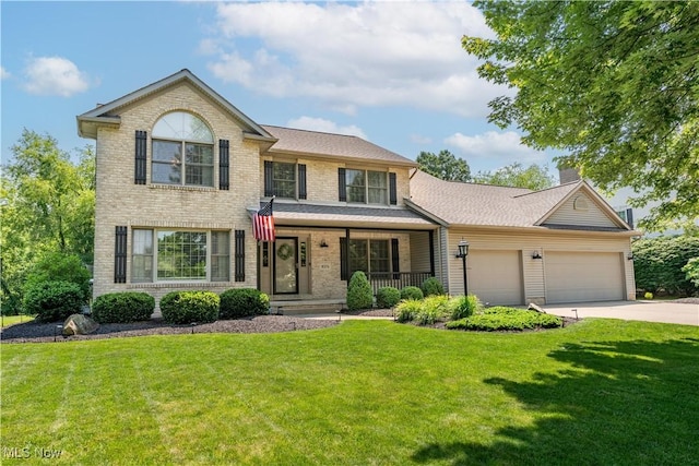 8374 Macthomas Ave NW, North Canton, OH 44720 - view of front of house with covered porch, a garage, a front lawn, concrete driveway, and a chimney