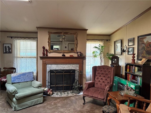 3 Concert Ln, Olmsted Twp, OH 44138 - carpeted living room featuring ornamental molding, a premium fireplace, and ceiling fan